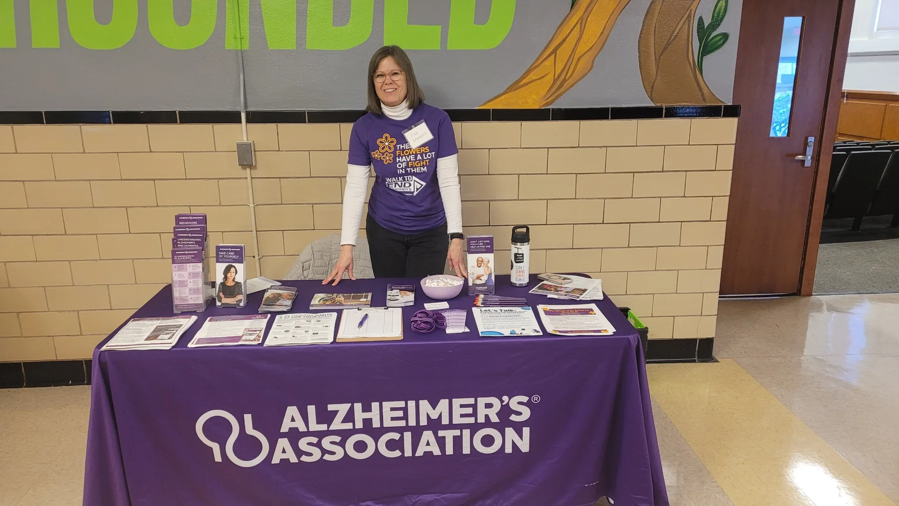 Alzheimer's Association outreach table offering dementia education resources
